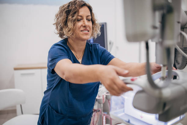 istock Female doctor working on ultrasound scanning machine 1938703728