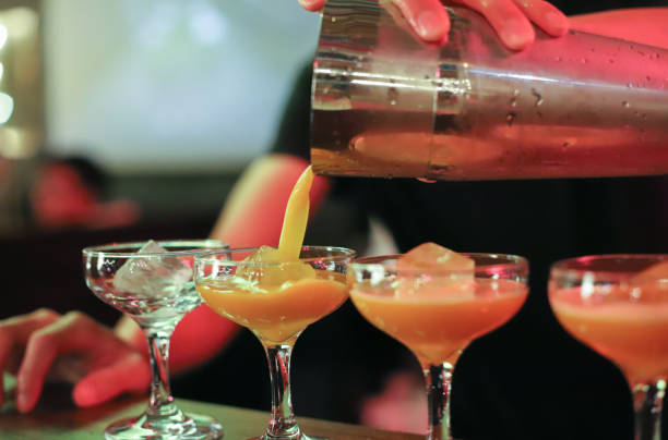 istock The bartender is making drinks for the guests in the nightclub. 1938800678