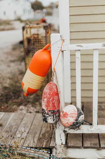 Lobstering Buoys Hanging Outside a Building in Maine in Mount Desert, Maine, United States