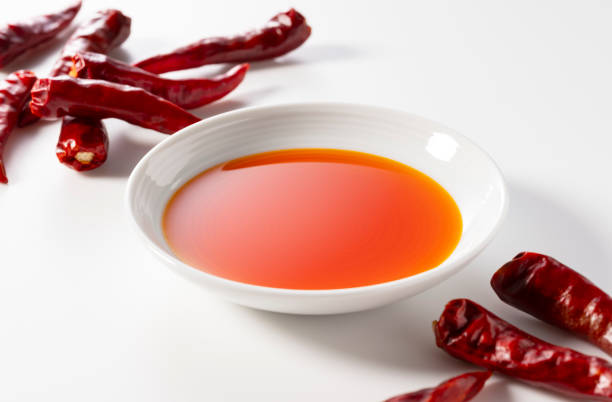 istock Chili oil in a ceramic dish placed on a white background. 1938857809