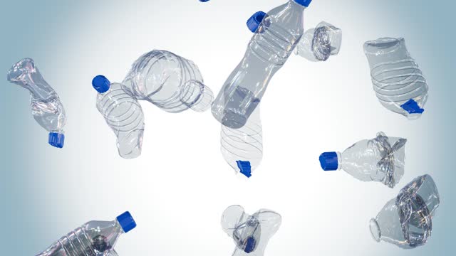 isolated falling discarded or creased plastic bottles