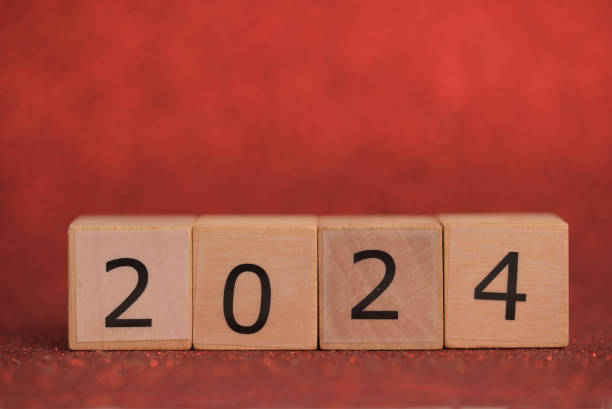 istock 2024 Wooden dice top on red backgrounds with empty space. 1938863202