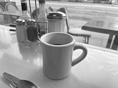 Espresso cup on a bar table in restaurant