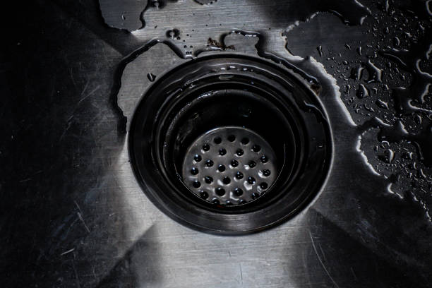 Close up of the plug hole in a bath.