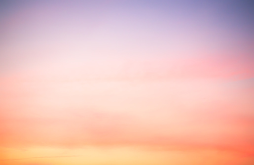 Sunset sky with blue and golden orange colors at dusk background