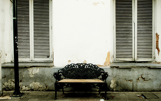 A classic bench in the street of Semarang, Indonesia.