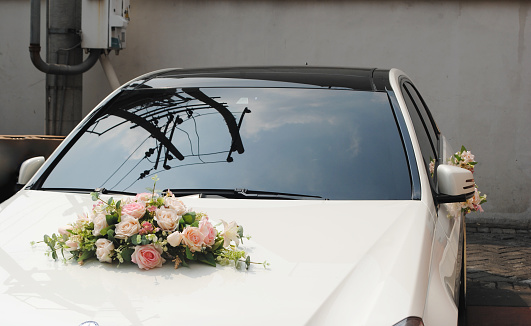 One wedding car is for the groom, best man and his groomsmen. The groom's car is the first to leave from the groom's house allowing them to welcome and seat guests.\nThe second wedding car is usually for the mother of the bride, the bridesmaids and flower girls.