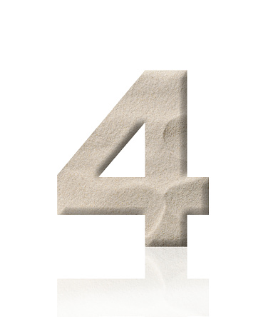 Close-up of three-dimensional sand number 4 on white background.