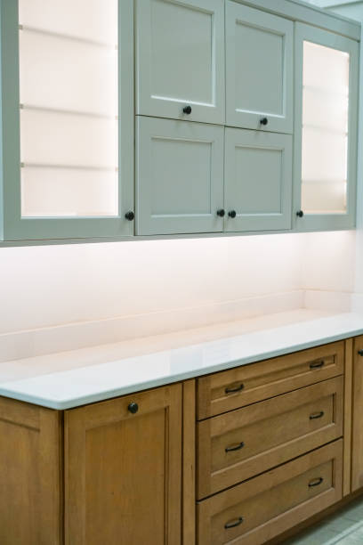 istock close up on white kitchen interior with plant and cabinet 1939110688