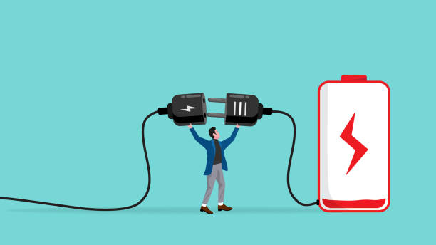 istock low battery, businessman low energy or tired, overworked or stressed at work, refresh or recover after tired at work, re charge yourself, businessman connect plug with low battery to power socket 1939114343