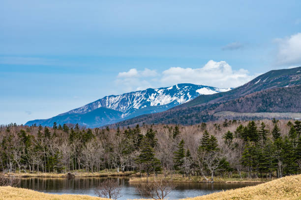 istock Beautiful lake and rolling mountain range on springtime sunny day 1939149496