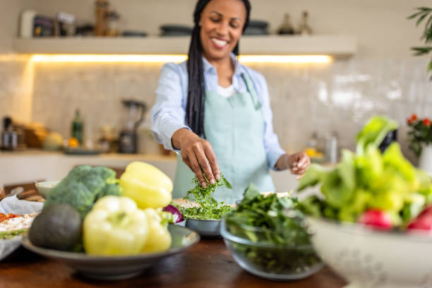 istock Happy woman in the kitchen 1939153662