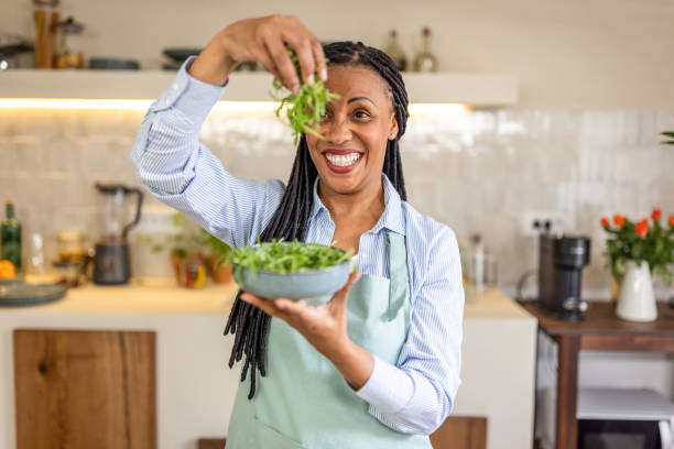 istock Happy woman in the kitchen 1939159969