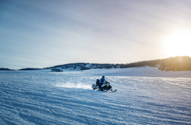 istock Speeding on a snowmobile in Colorado, USA 1939169403