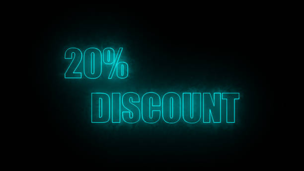 istock Neon sign with the text 20% Discount lowing in green on a dark background. 1939185512