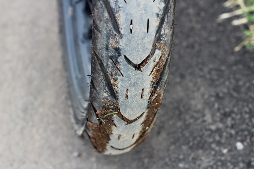 motorbike wheels filled with mud