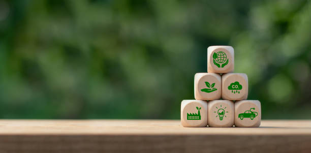 istock Green business and sustainable development, Save of earth, saving environment, ESG, Co2 and net zero emissions concept. Wooden cubes with clean energy icon standing on eco friendly icon. Copy space. 1939197687