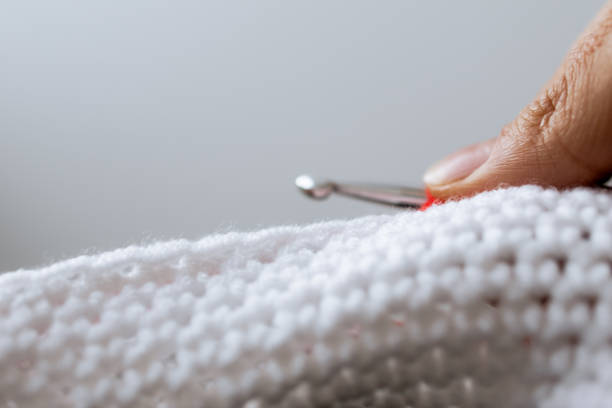 Threading sewing needle