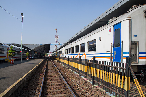 Lviv, Ukraine - March 3, 2022: Ukrainians wait outside a train at the station in Lviv.