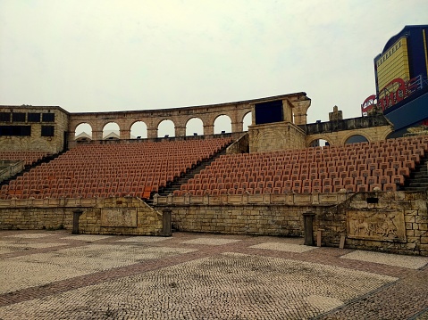 Macau, China - April 4, 2019 : Roman Amphitheatre or Colosseum at Macau Fisherman's Wharf in China