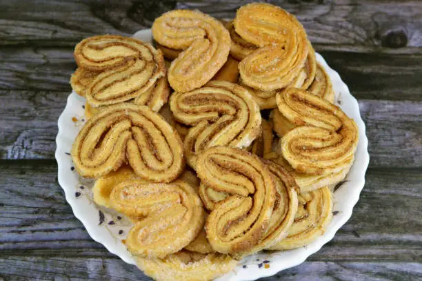 Photo of palmier, short for feuille de palmier 'palm tree leaf, French hearts cookies, Palmiers are made from puff pastry, a laminated dough similar to the dough used for croissant, but without yeast