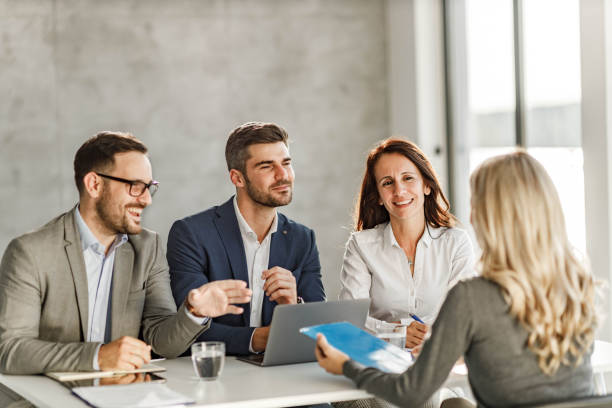 istock Happy human resource team talking to a candidate on a job interview. 1939258991