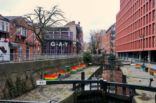 Manchester, United Kingdom - 12 29 2023 : Canal with its colorful blocks, in Gay village