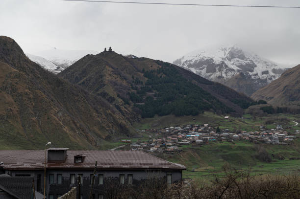 The Mountain along the way to Kazbergi. Beautiful view of the city of Mtskheta. stock photo