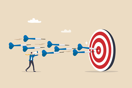 Marketing target strategy, leadership or skill to reach target or achievement, aiming for perfection winning, challenge or accuracy concept, businessman control dart to reach perfect target bullseye.