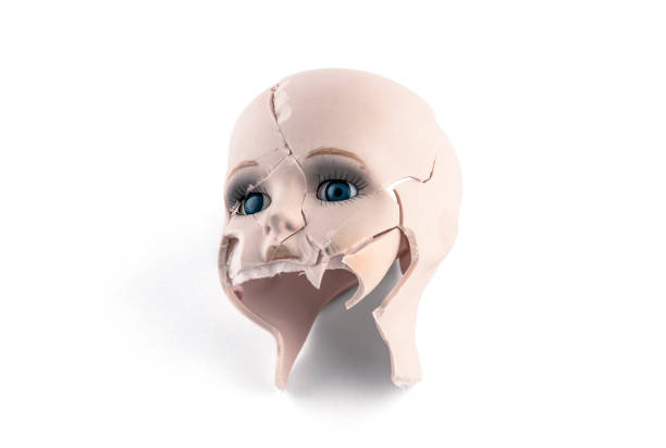 istock Broken vintage doll head isolated on white background with clipping path 1939376104