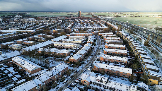 Aerial view of the residential area of  Amersfoort Nieuwland, a large city of within the Netherlands at the winter with snow