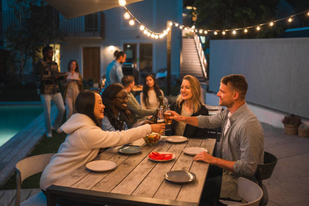 istock Diverse Friends Enjoying Outdoor Evening Party 1939453338