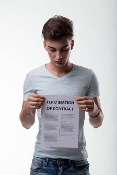 istock Pensive youth holds termination, a pivotal moment 1939465658
