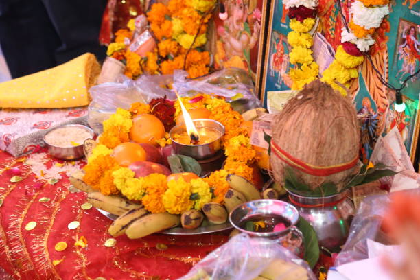 istock Diya and prasad at mandir in india 1939500247