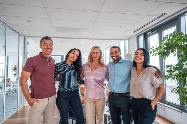 istock Diverse Business Team Smiling in Office Environment 1939528272