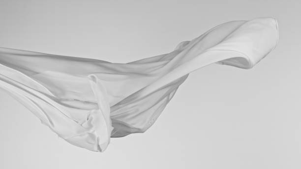 istock White color transparent silk fabric flowing by wind 1939547295