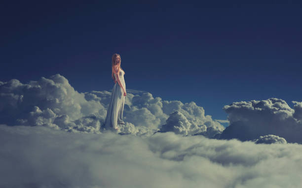istock woman in the clouds 1939578706