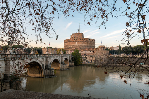 Rome, Italy - May 27, 2018: Castel Sant'Angelo mausoleum - Castle of the Holy Angel and Ponte Sant'Angelo bridge over Tiber river in historic city center of Rome