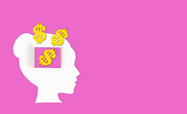 istock Woman Head Paper Shape with Open Mind and Dollar Signs 1939608333