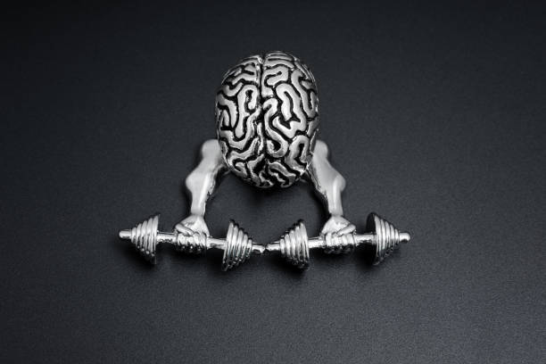 istock Fit Brain Pumping Up Mind Muscles with Muscular Hands 1939613944