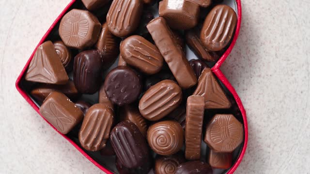 Chocolate candies pralines, truffles. Sugar addiction concept