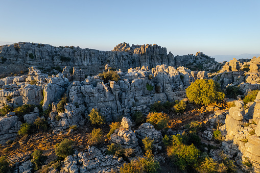 Unreal rock formation and landscape of Torcal de Antequera in Malaga, Andalusia, Spain. Aerial drone View