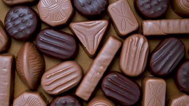 Chocolate candies pralines, truffles. Sugar addiction concept