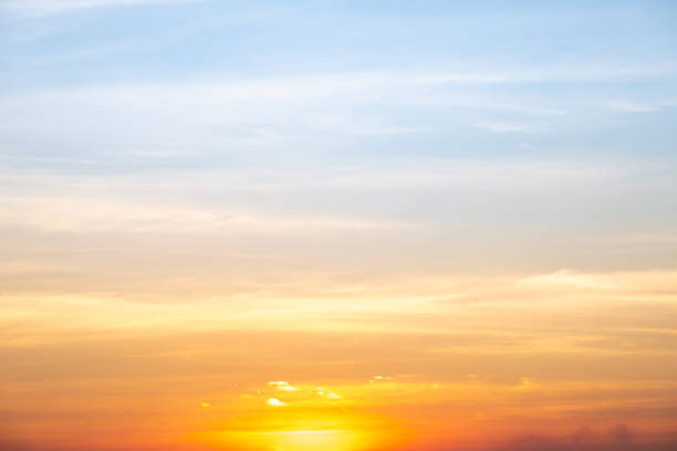 istock Beautiful , luxury soft gradient orange gold clouds and sunlight on the blue sky perfect for the background, take in everning,Twilight, Large size, high definition landscape photo 1939672253