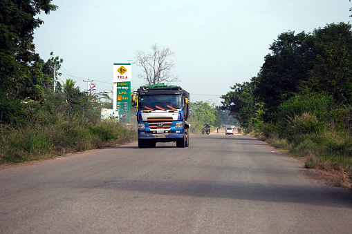 Truck riding on road 66 in Siem Reap province of Cambodia.