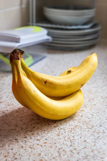 istock Fresh ripe banana fruit on kitchen tabletop 1939766130
