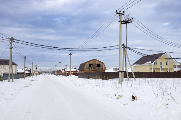 istock External electrical networks in the Siberian village 1939767295