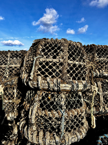 A pile of lobster pots. Picture taken on a sunny day