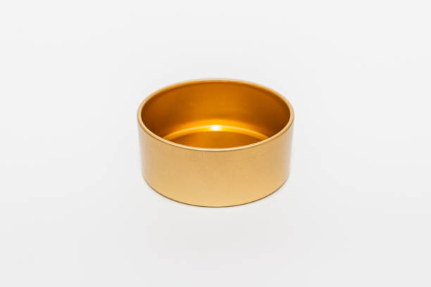 istock Yellow golden round empty metal box on white background.Soft focus,copy space. 1939787922
