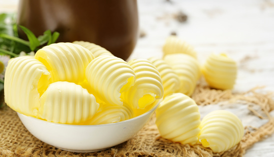 organic butter dairy product on wooden table